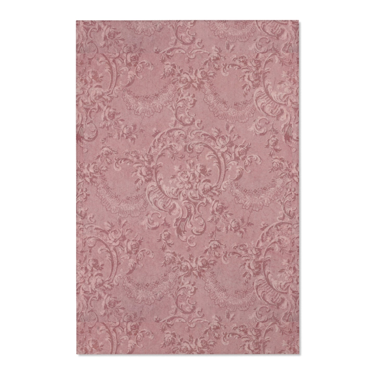 Close detail of the scrollwork and roses on the area rug