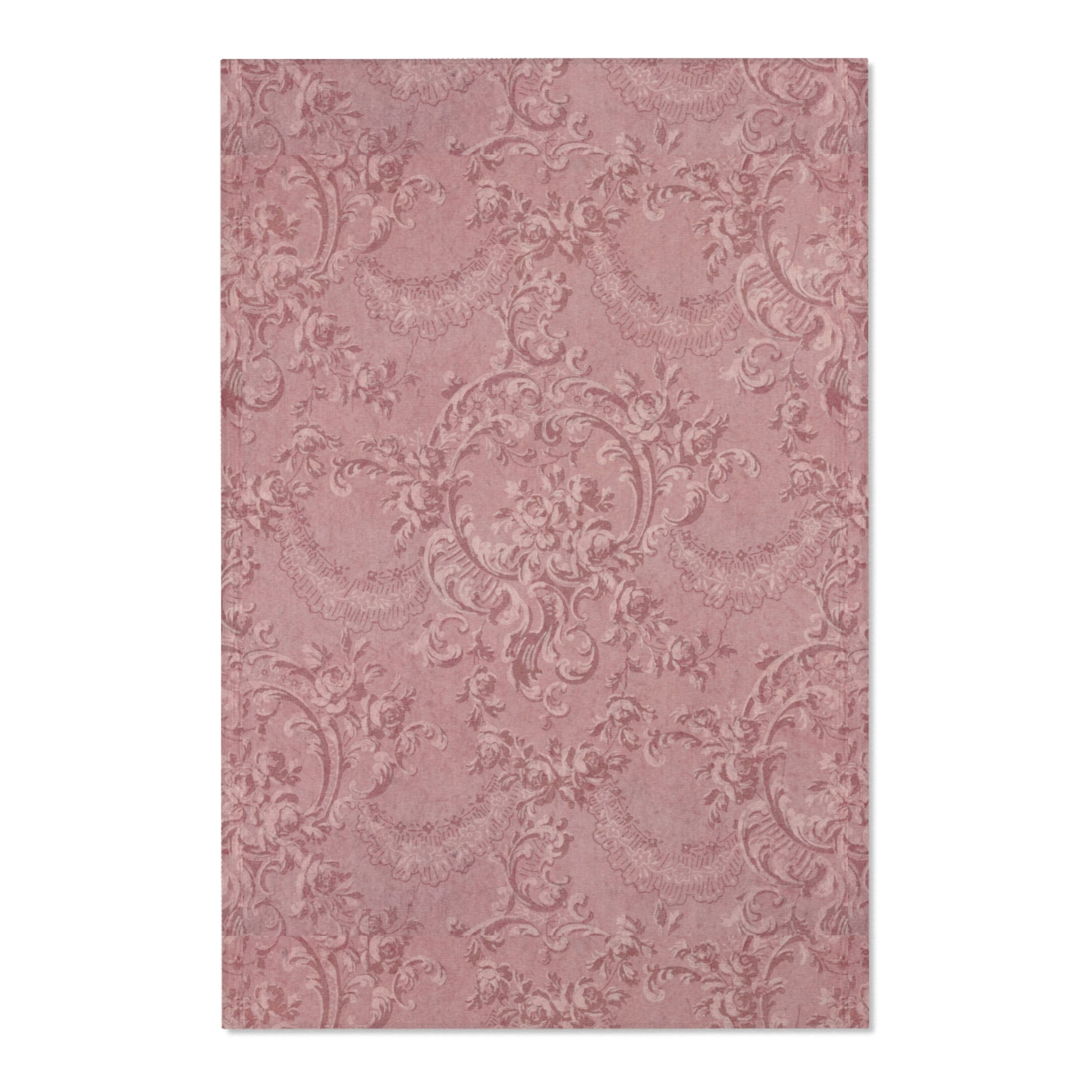 Close detail of the scrollwork and roses on the area rug