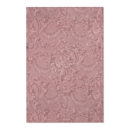 Close detail of the scrollwork and roses on the area rug