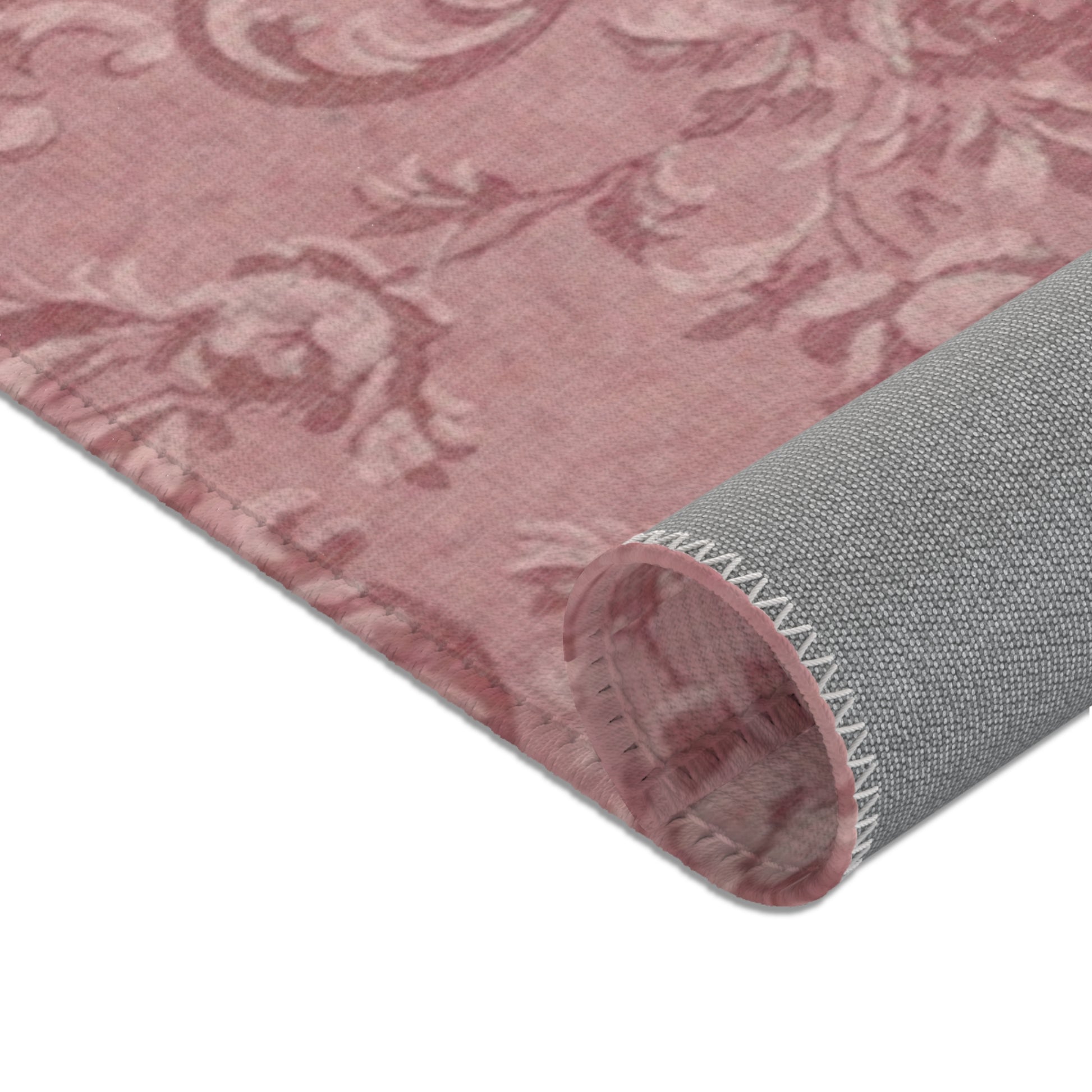 Nursery area rug in a tonal dusty rose palette