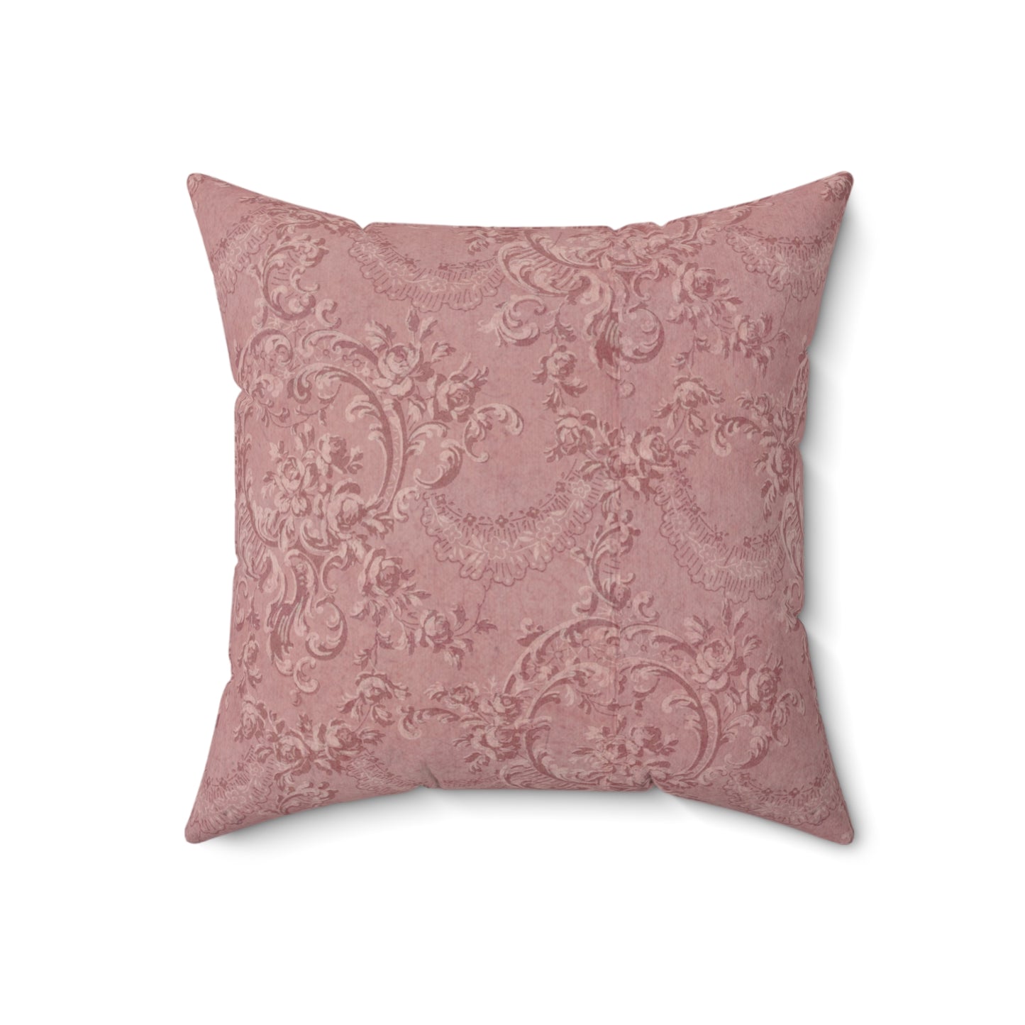 Close detail of the roses and lace swags on the faux suede pillow
