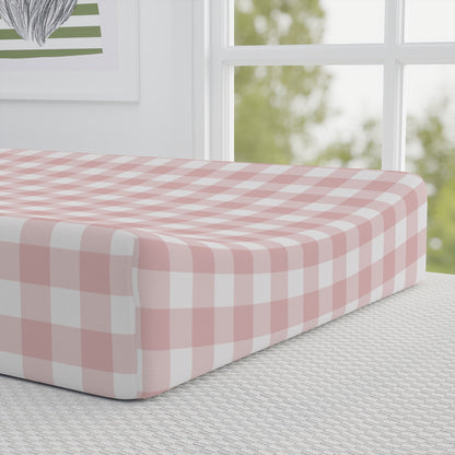 Rose Gingham pad cover matching the nursery crib sheet
