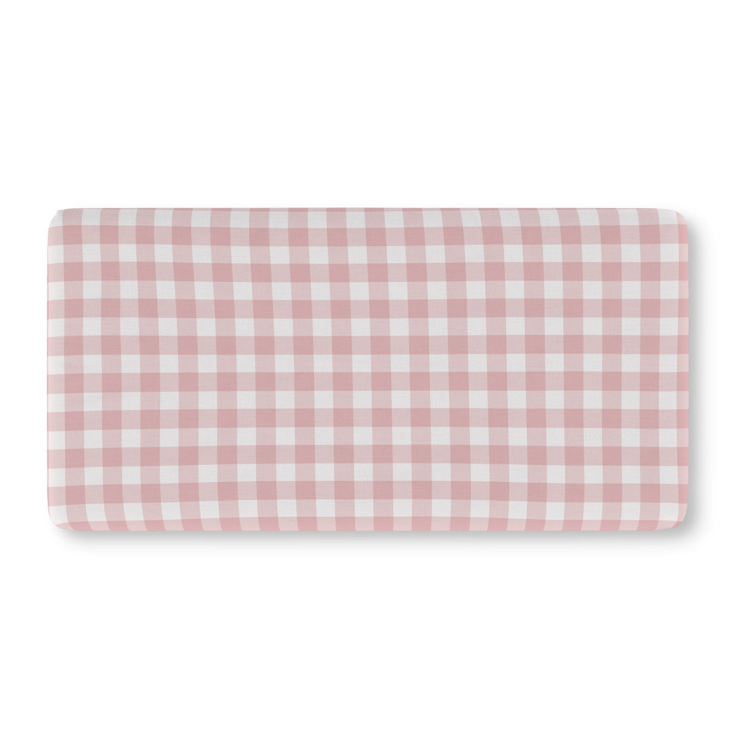 Vintage pink gingham crib sheet on a standard crib mattress