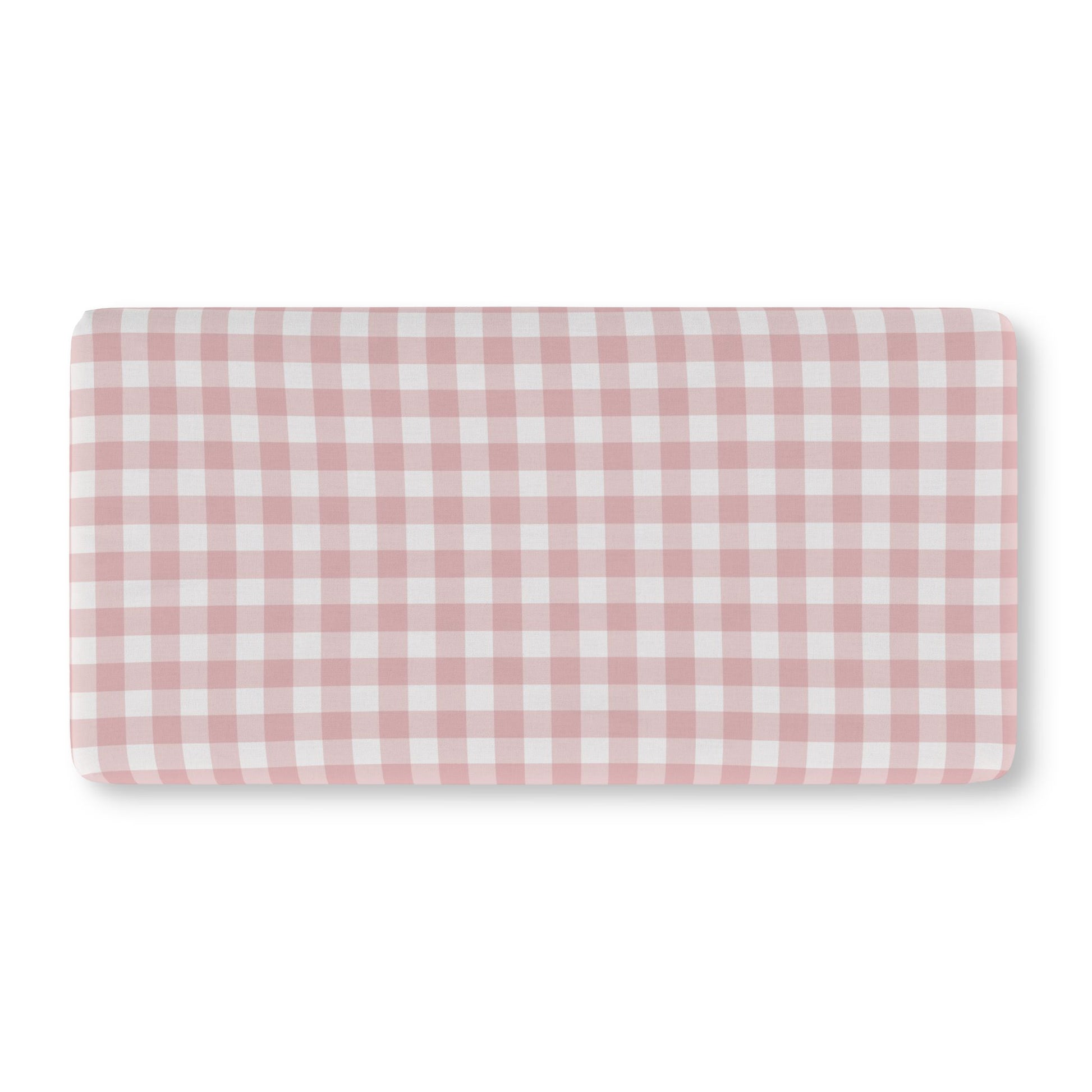 Vintage pink gingham crib sheet on a standard crib mattress