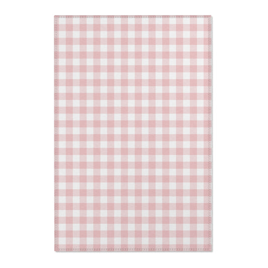 Rose Gingham nursery area rug in a baby girl's bedroom