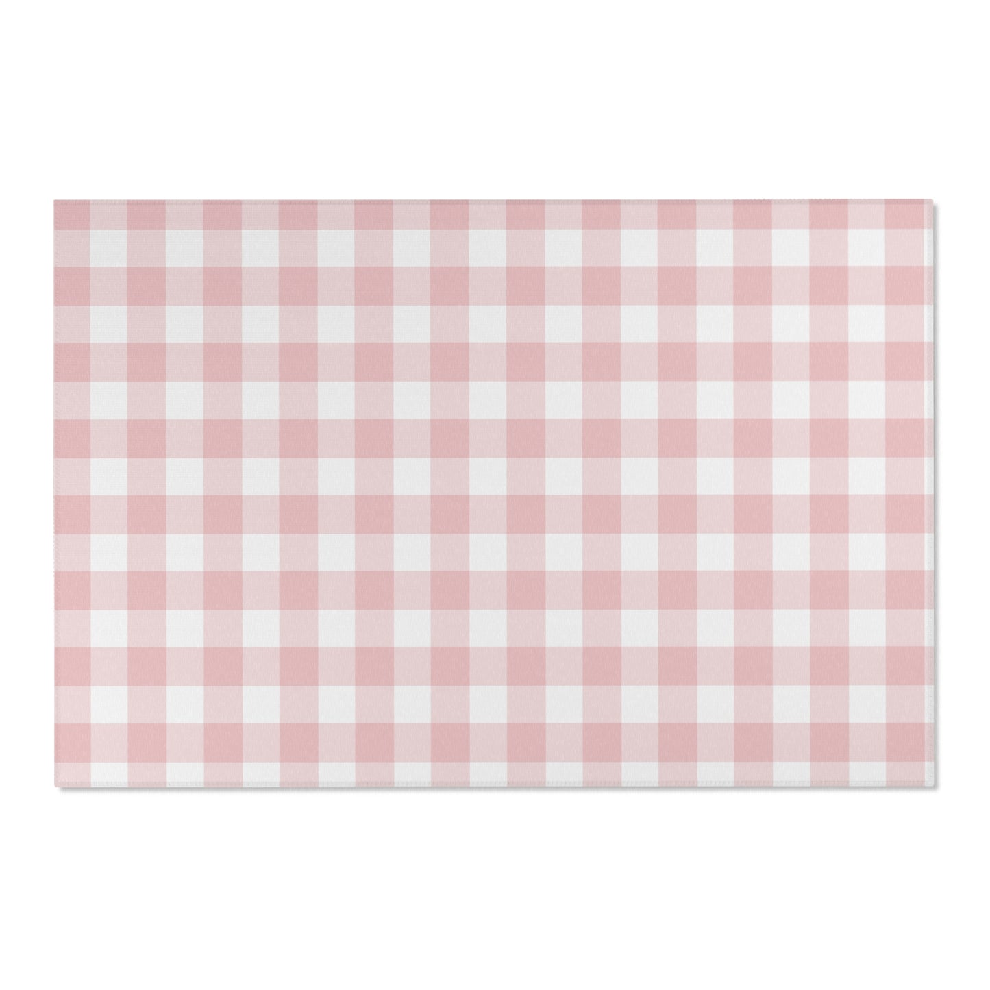 Dusty rose check rug defining a nursery play area