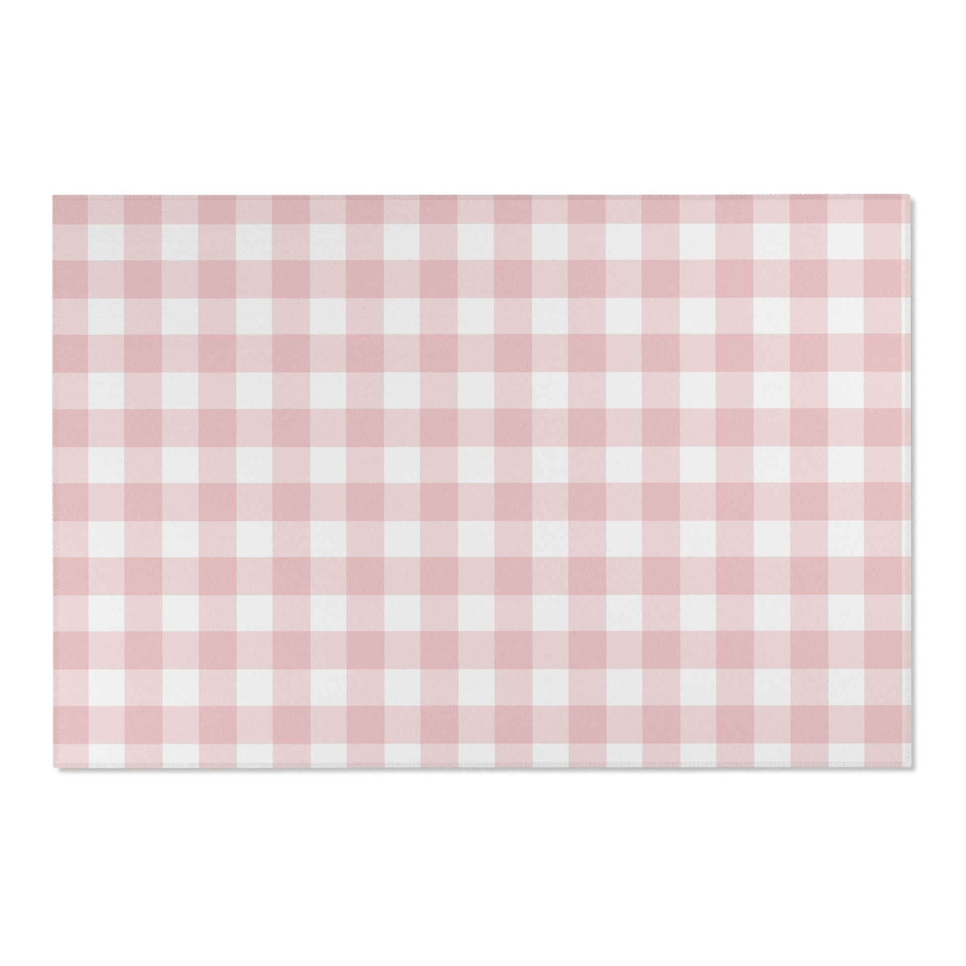 Dusty rose check rug defining a nursery play area