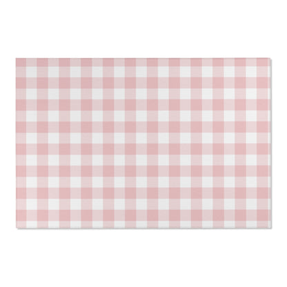 Dusty rose check rug defining a nursery play area