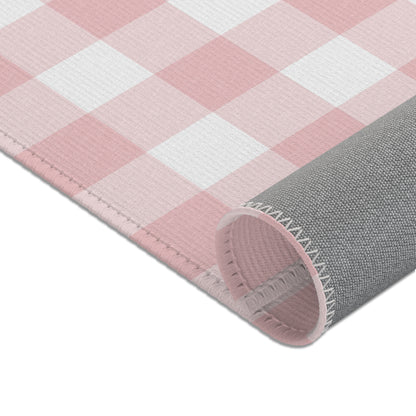 Rose Gingham rug shown in a styled nursery