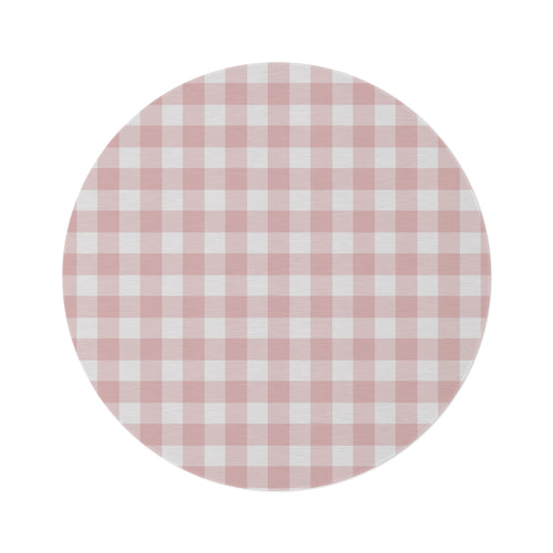 Rose Gingham round nursery rug on a baby room floor