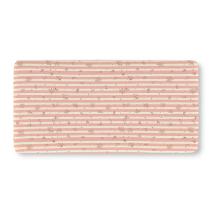 Fitted crib sheet with pink ticking stripes and small roses
