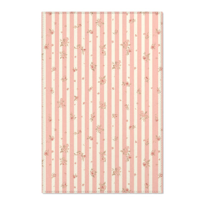 Rose Stripe nursery area rug in a baby room