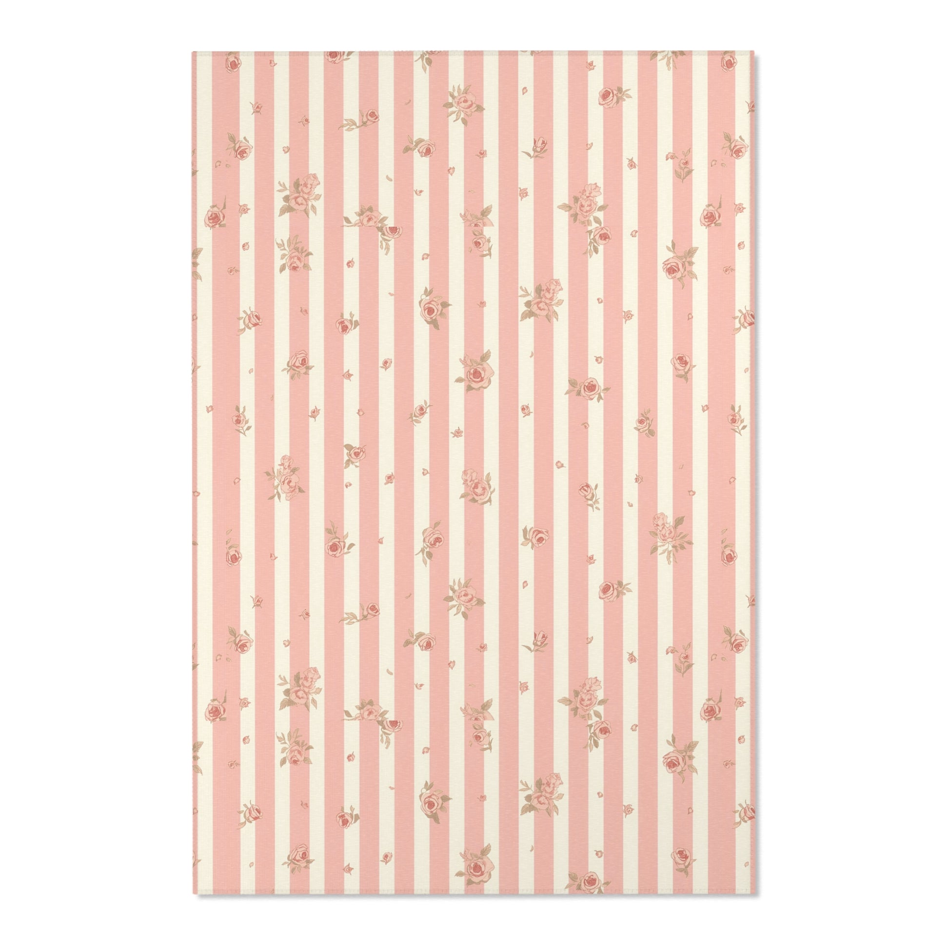Close detail of the stripes and roses on the nursery area rug