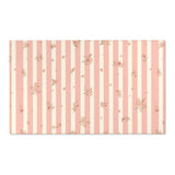 Rose Stripe nursery area rug in a baby room