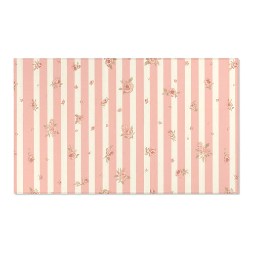 Rose Stripe nursery area rug in a baby room