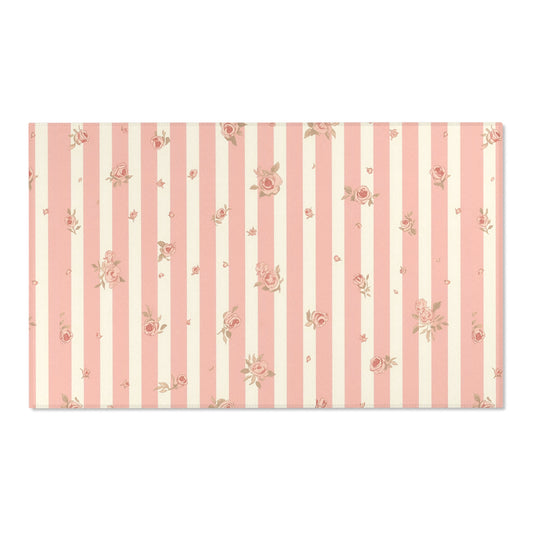 Rose Stripe nursery area rug in a baby room