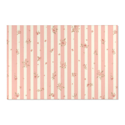 Low pile nursery rug with pink and cream ticking stripes