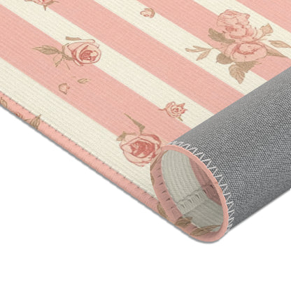 Corner detail of the Rose Stripe nursery area rug