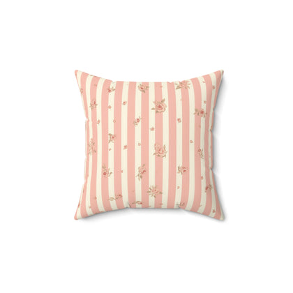 Rose Stripe decorative nursery pillow on a glider chair