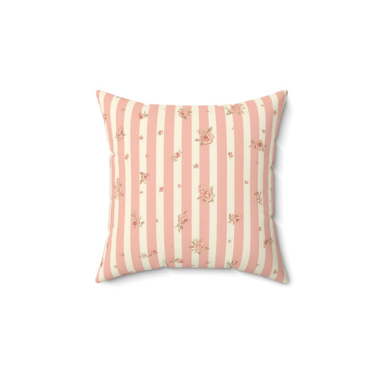 Rose Stripe decorative nursery pillow on a glider chair