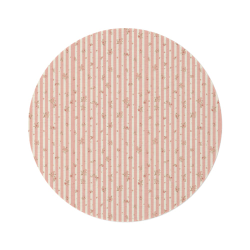 Rose Stripe round nursery rug on a baby room floor
