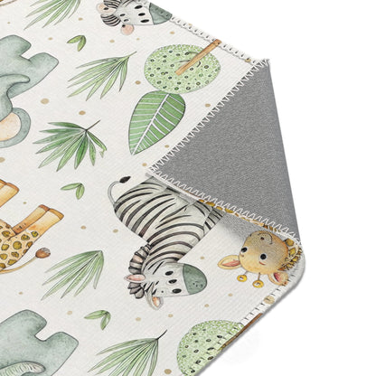 Safari animal area rug styled with nursery furniture