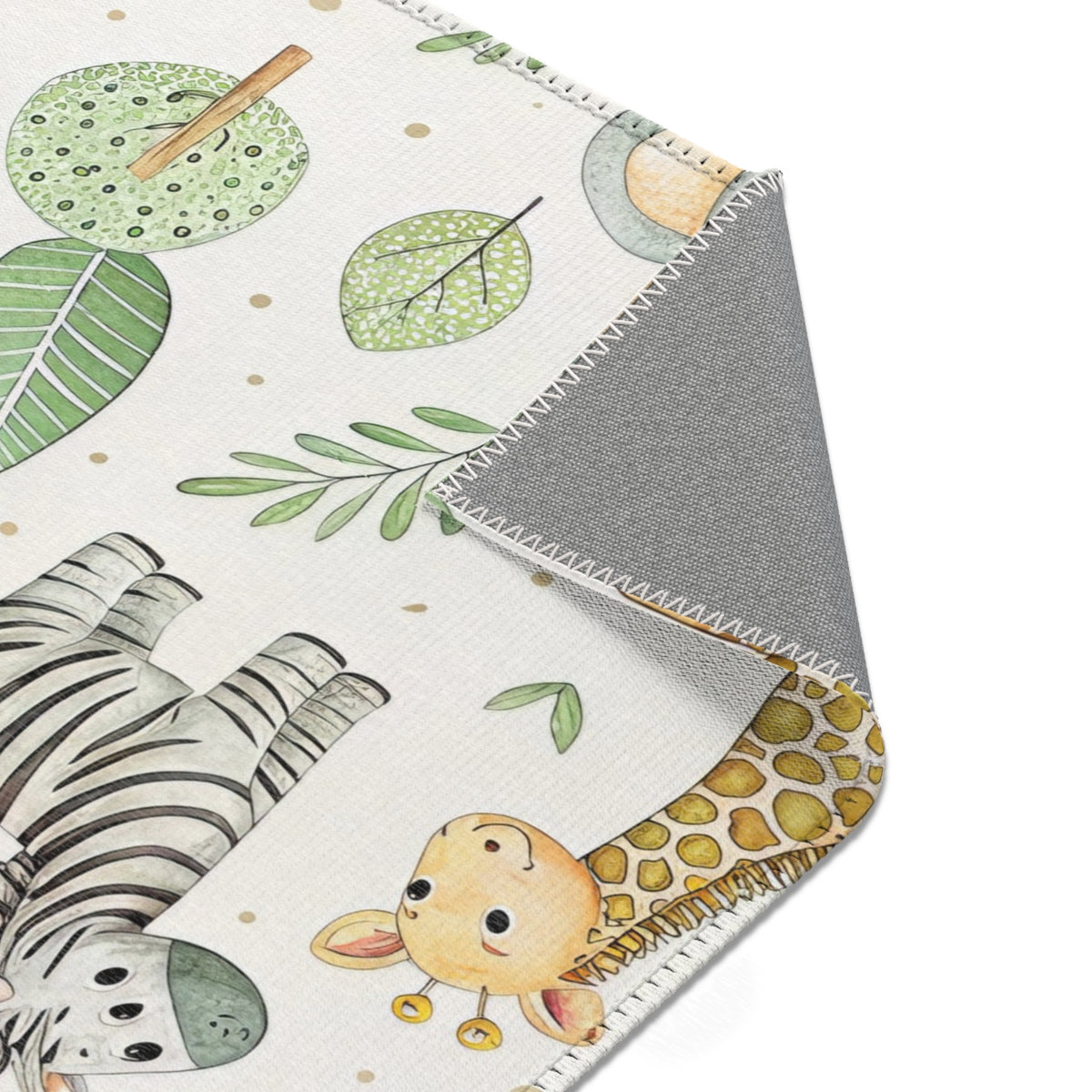 Safari animal rug beside a nursery glider chair