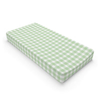 Sage Gingham changing pad cover on a nursery changing table