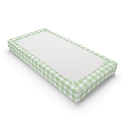 Fitted changing pad cover in sage gingham with elastic edges
