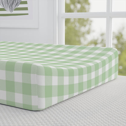 Sage Gingham pad cover matching the nursery crib sheet