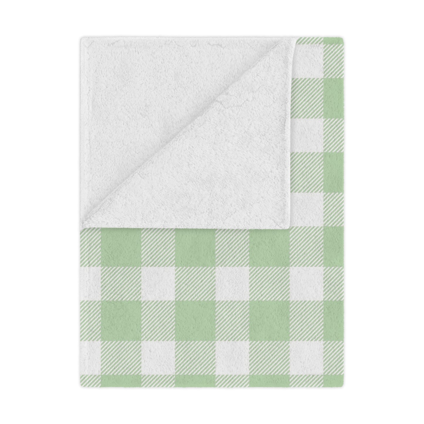 Sage Gingham minky baby blanket draped over a crib