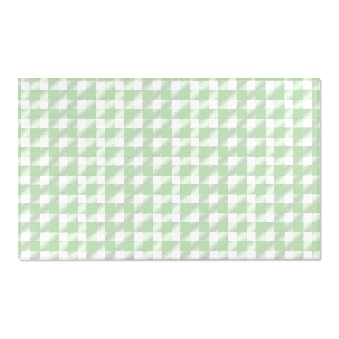 Sage Gingham area rug on a light wood floor