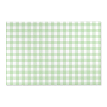Soft green check rug defining a nursery play area
