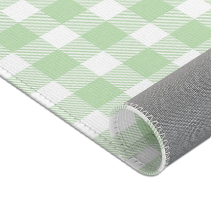 Sage Gingham rug shown in a styled nursery