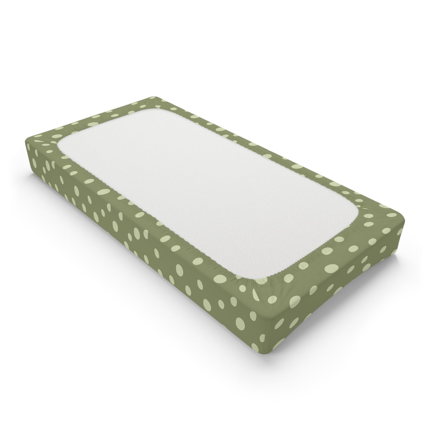 Changing pad cover in scattered cream dots on sage green