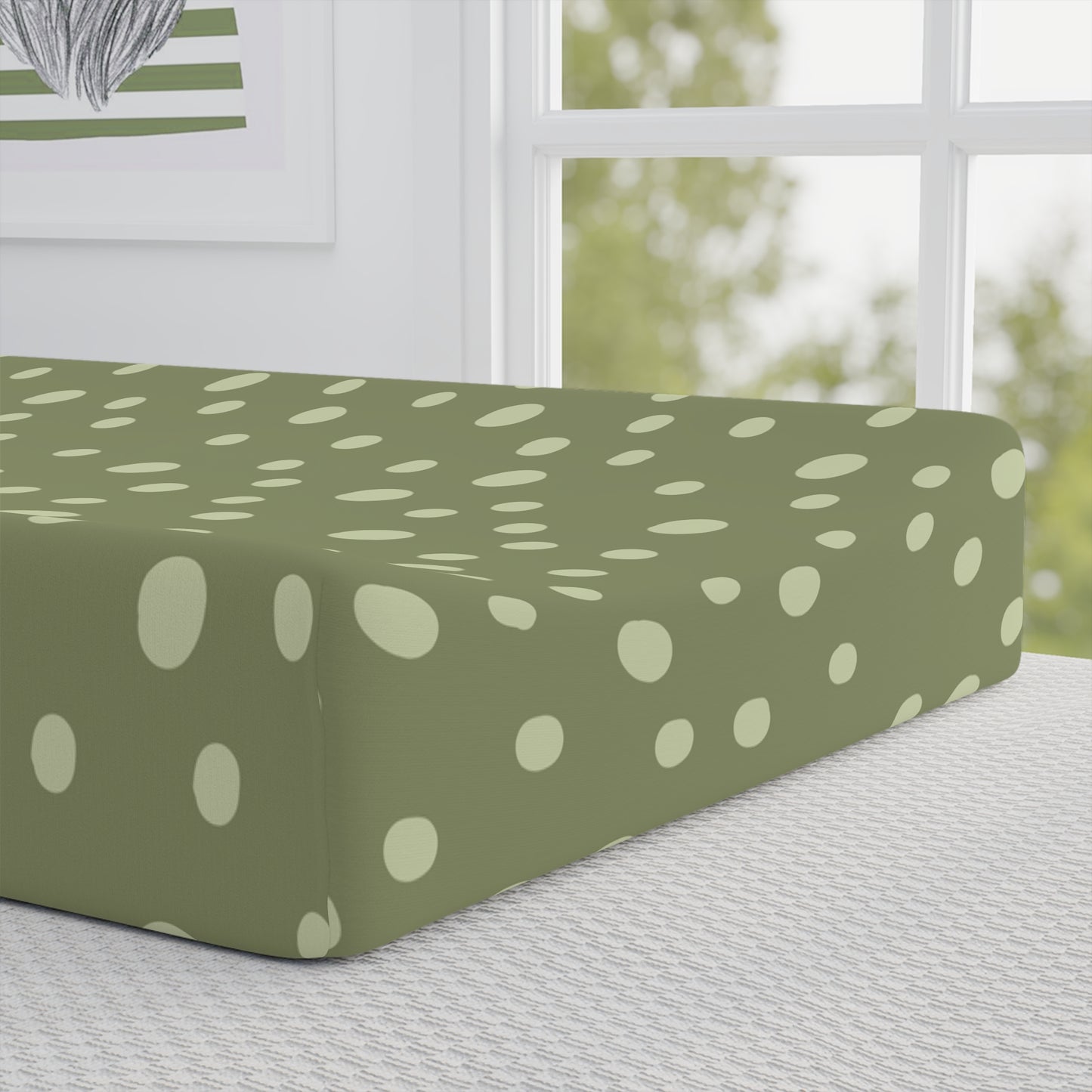Close detail of the Sage Speckle dot print on the changing pad cover