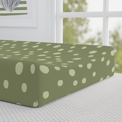 Close detail of the Sage Speckle dot print on the changing pad cover
