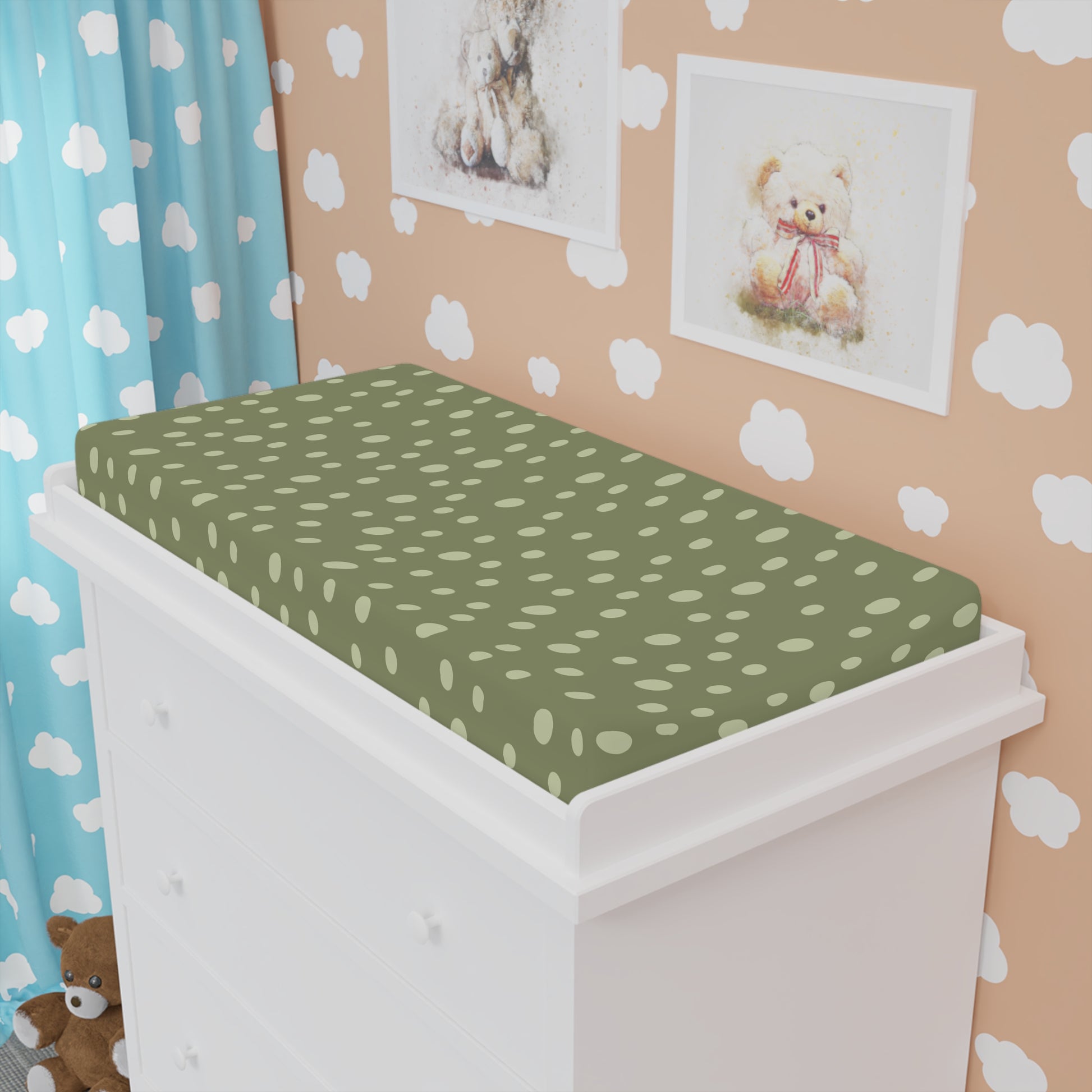 Sage Speckle changing pad cover fitted over a contoured pad