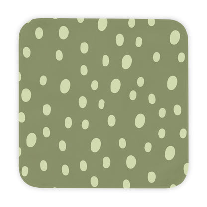 Sage Speckle hooded baby towel wrapped around a baby