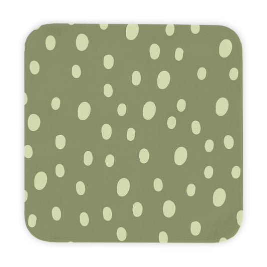 Sage Speckle hooded baby towel wrapped around a baby