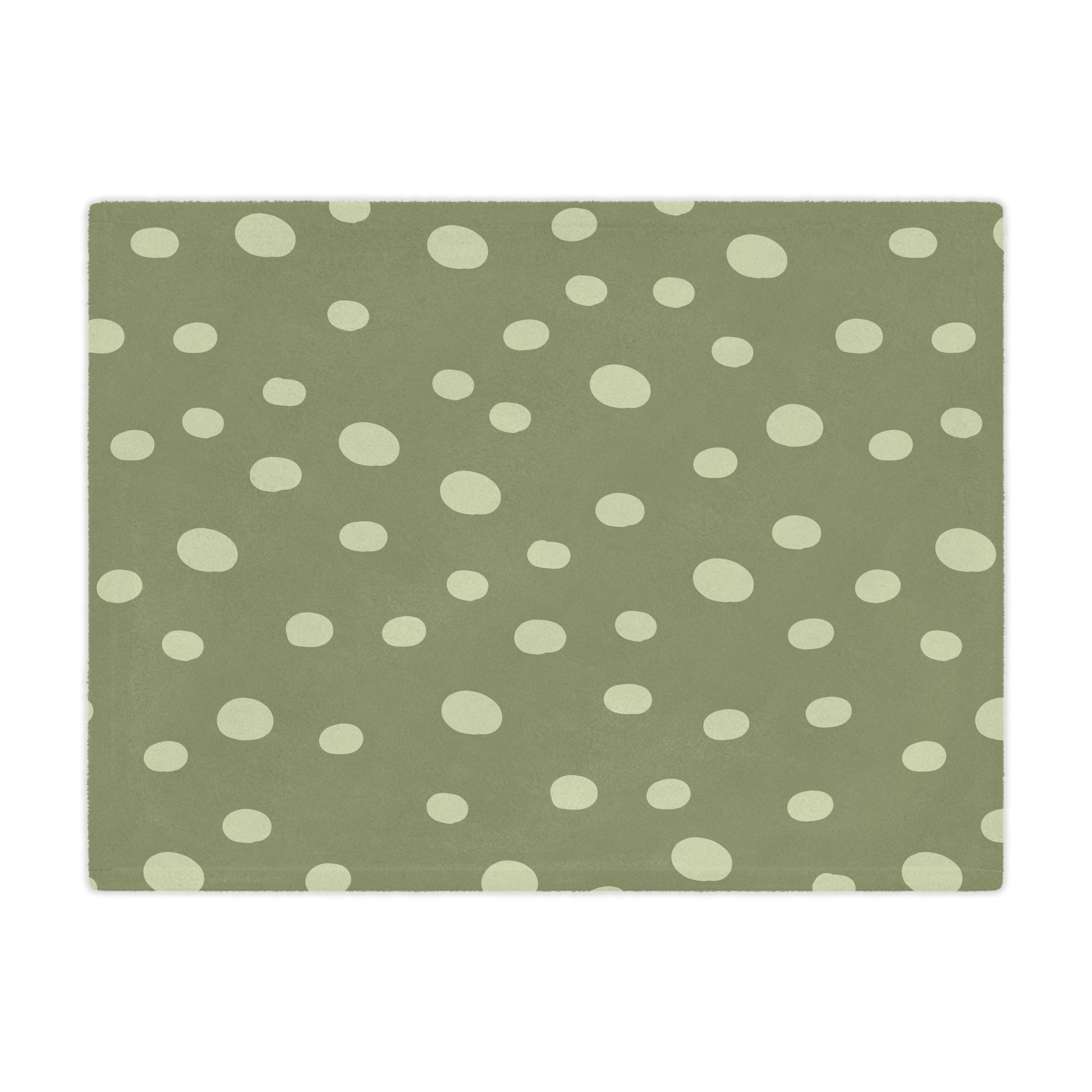 Close detail of the hand-painted dot print on the minky baby blanket