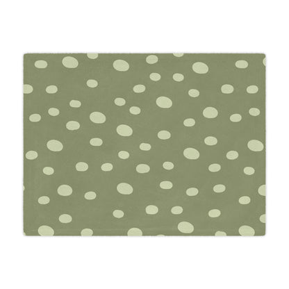 Close detail of the hand-painted dot print on the minky baby blanket