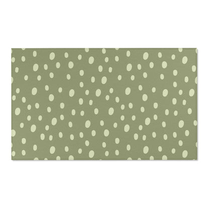 Sage Speckle area rug shown in portrait orientation