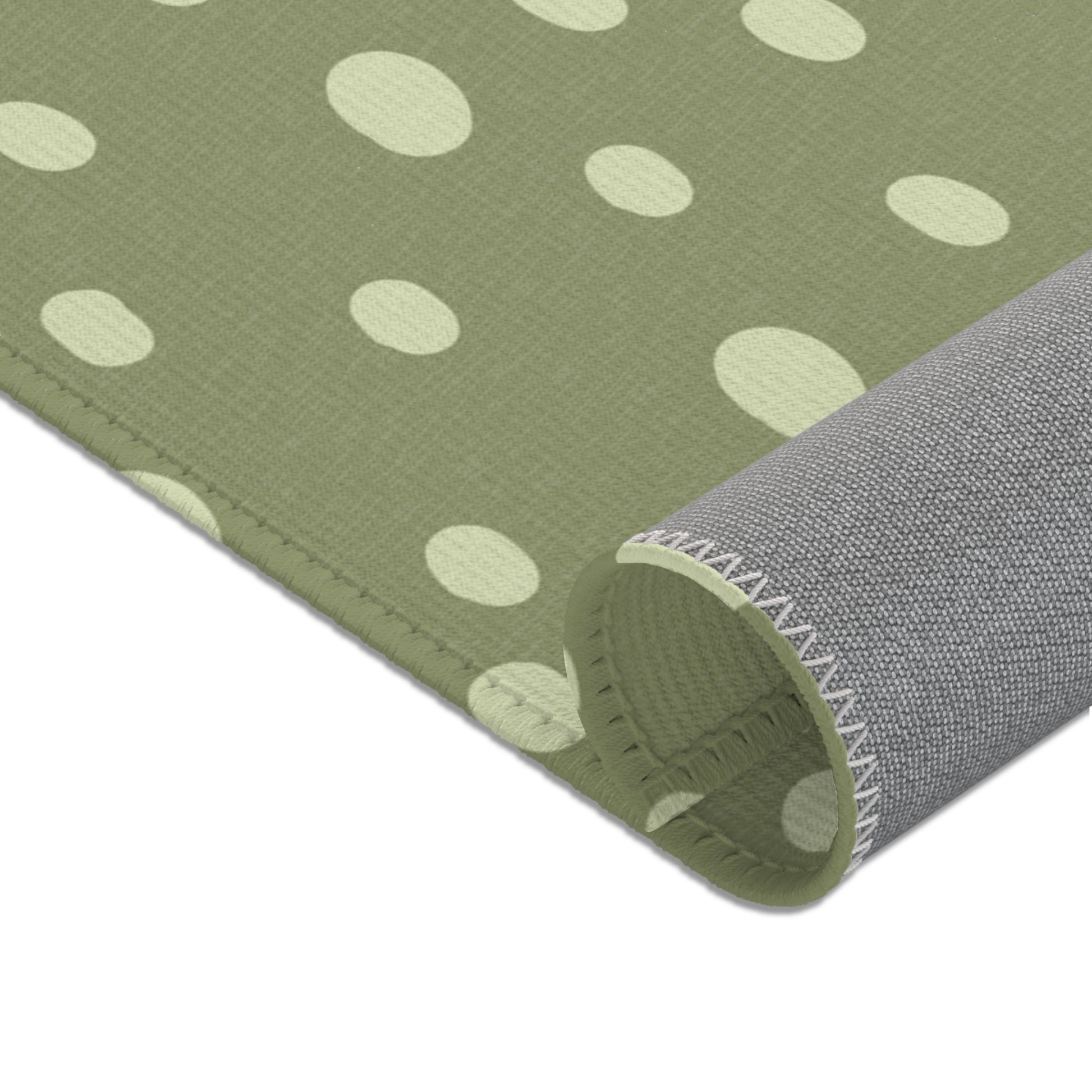 Corner detail of the Sage Speckle nursery area rug