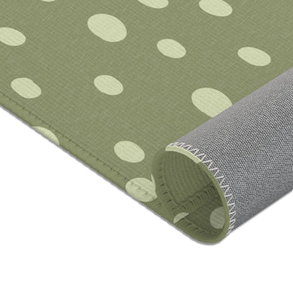 Corner detail of the Sage Speckle nursery area rug