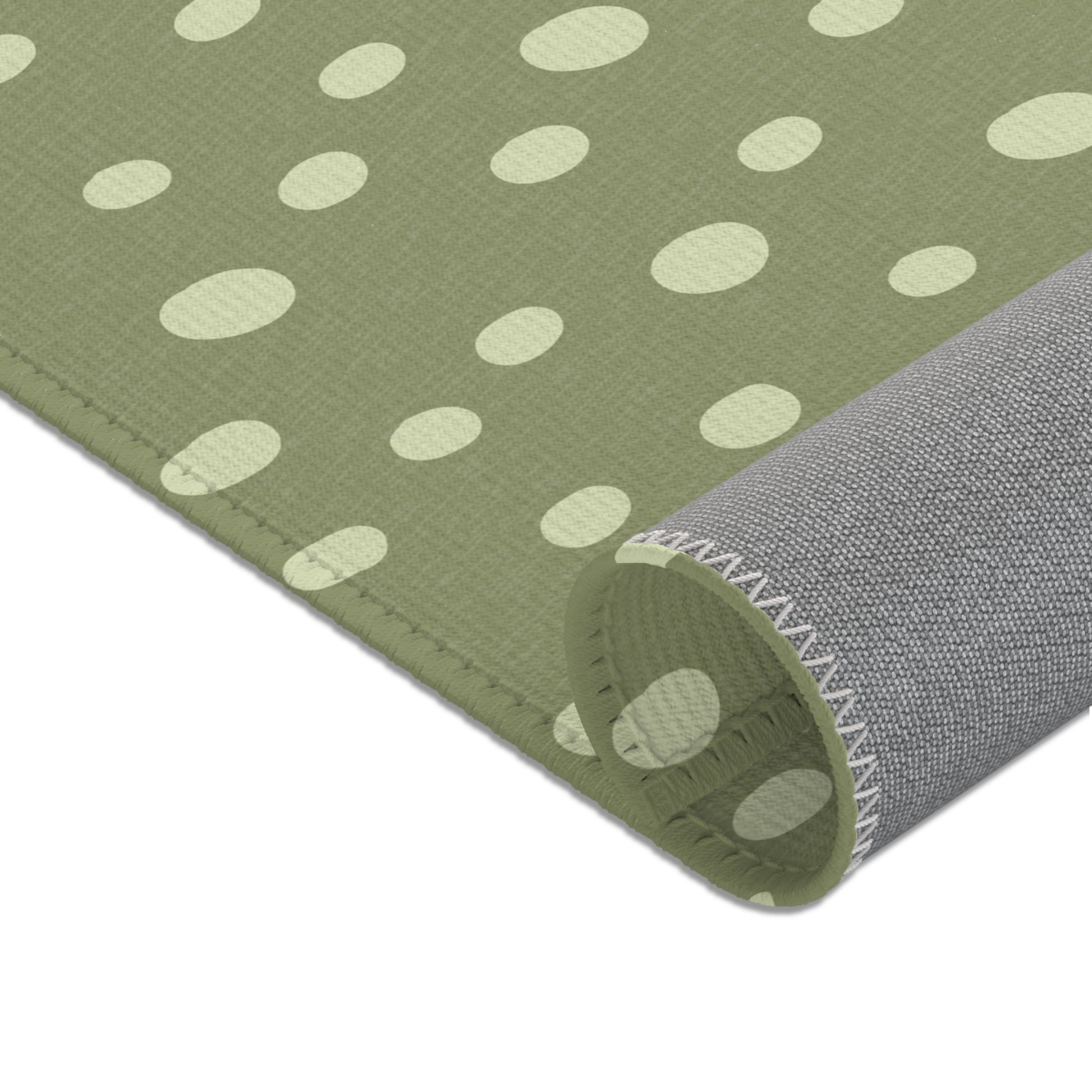 Uneven cream dots printed across the nursery area rug