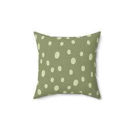 Sage Speckle decorative nursery pillow on a glider chair