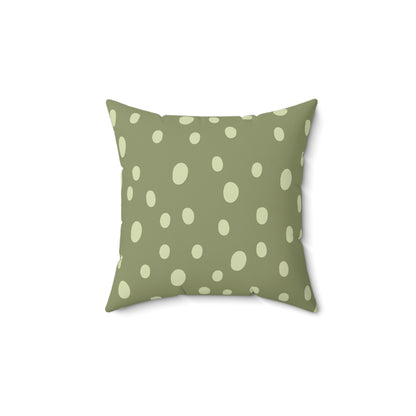 Sage Speckle decorative nursery pillow on a glider chair