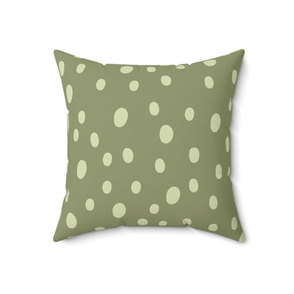 Close detail of the hand-painted dots on the faux suede pillow