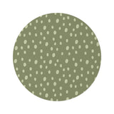 Sage Speckle round nursery rug on a baby room floor